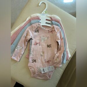NWT Carter's set of 4 bodysuits
